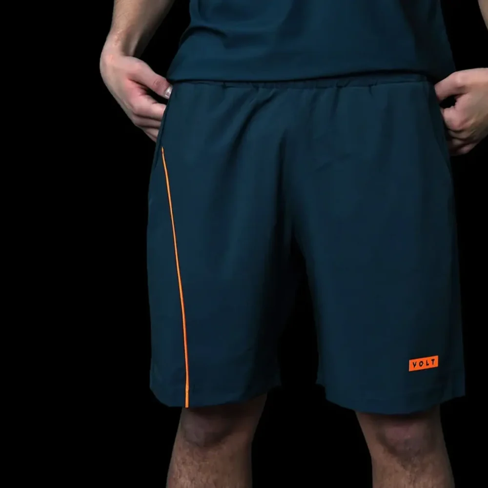 VOLT Performance Padel Shorts 2026 Blue Orange 01